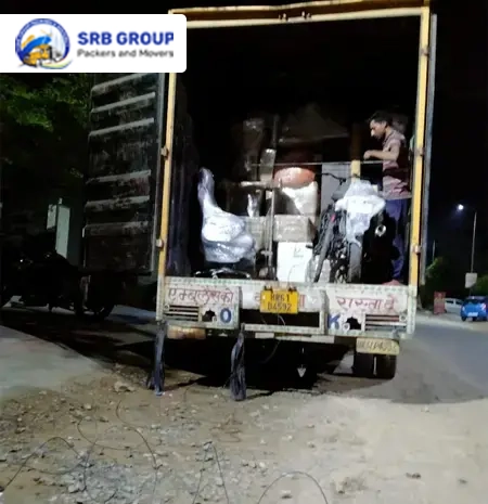 Professional team packing for household relocation with SRB Group Packers and Movers